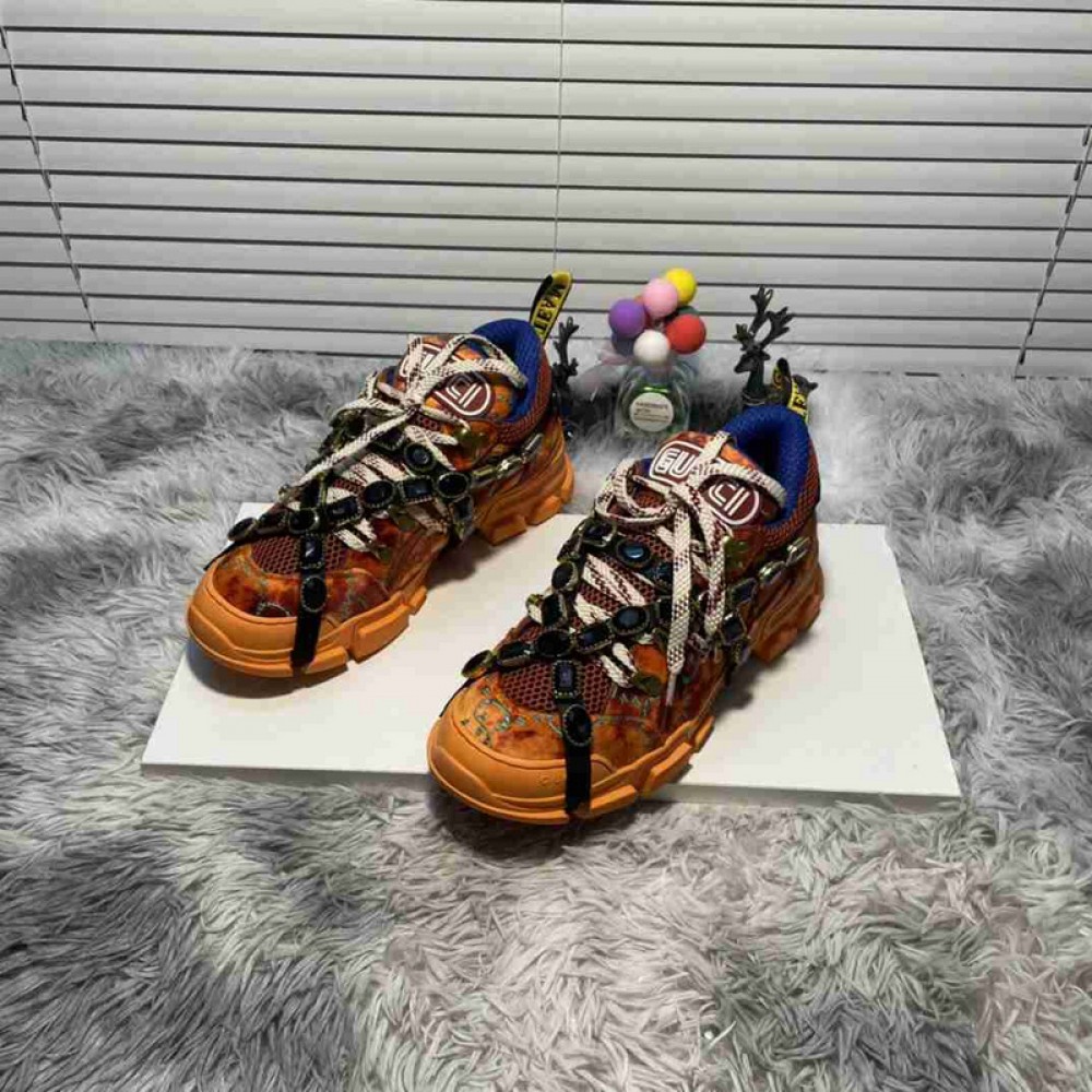 G*u*i1 sneakers