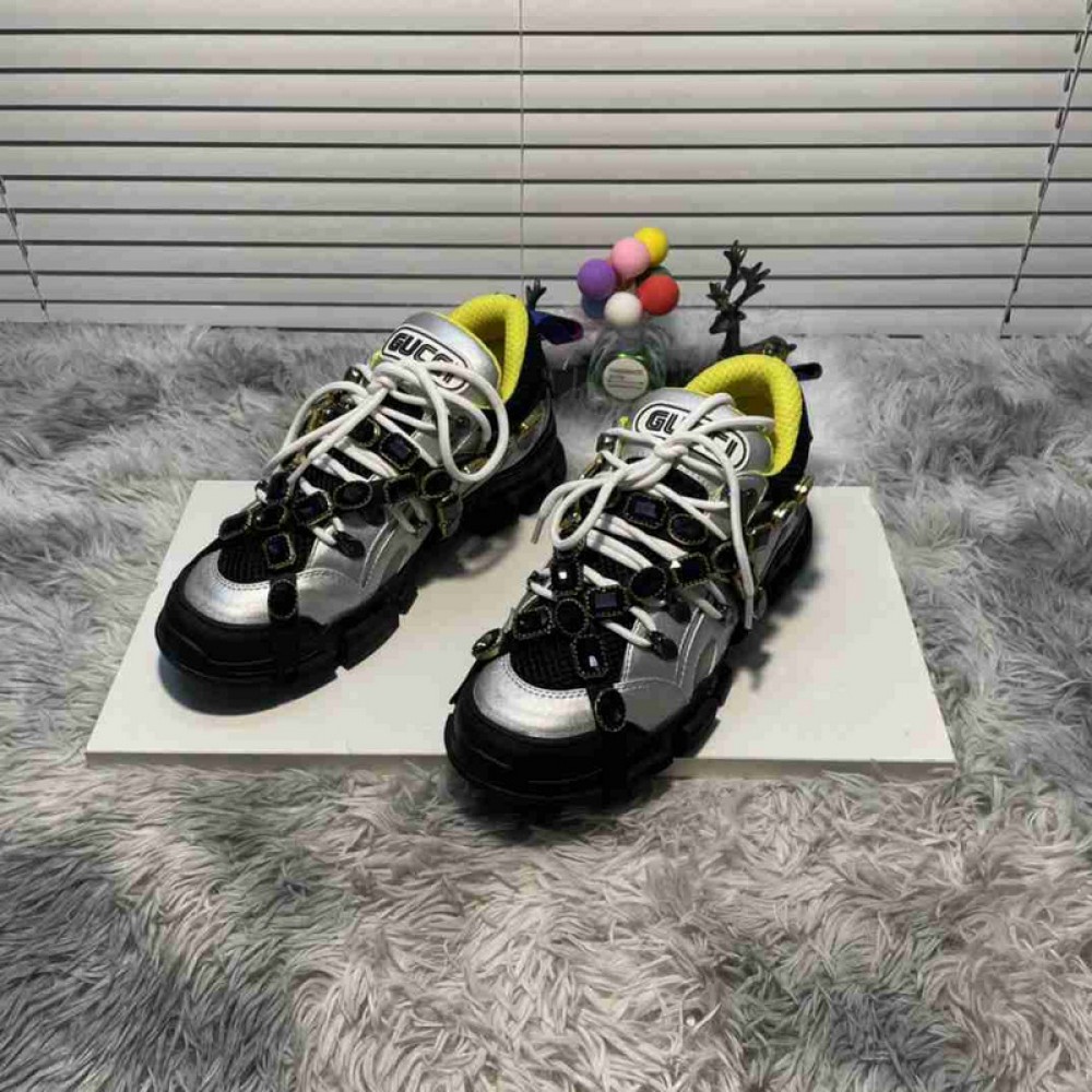 G*u*i1 sneakers
