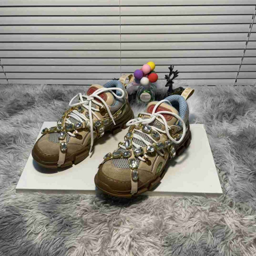G*u*i1 sneakers