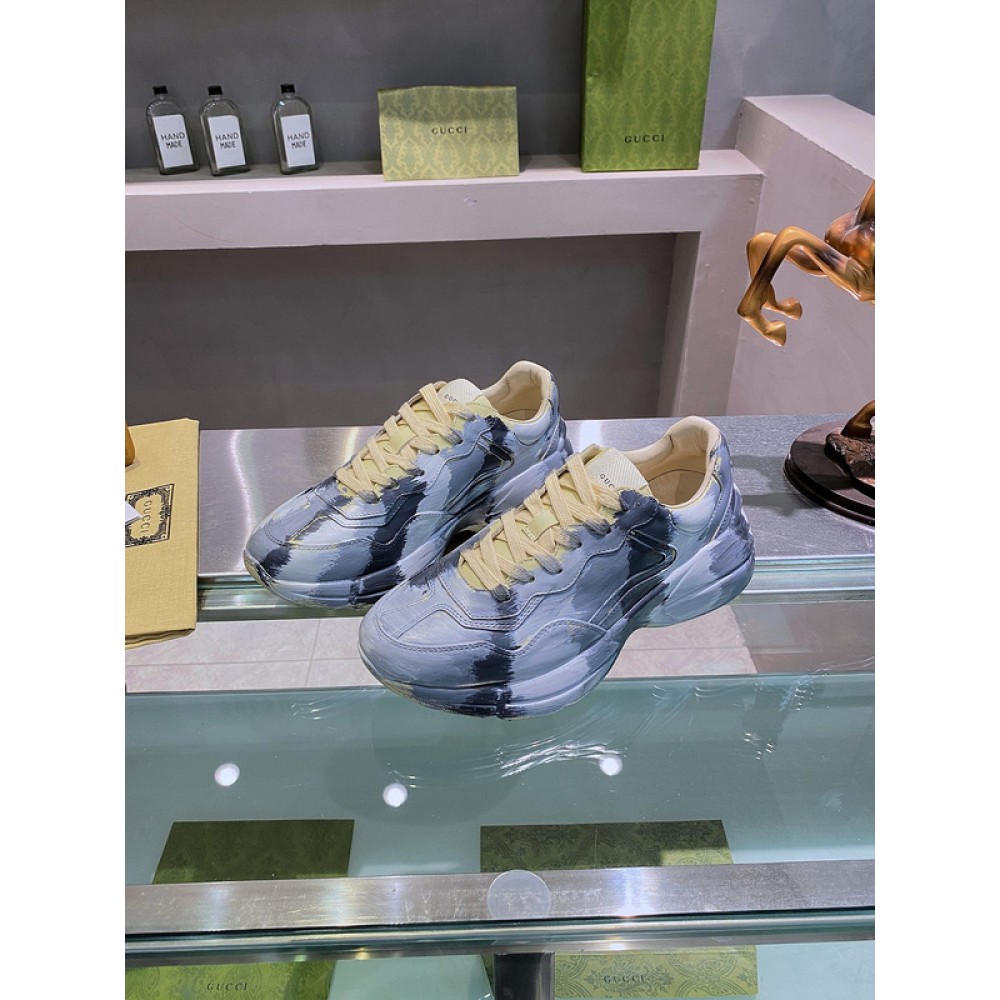 G*u*i1 sneakers