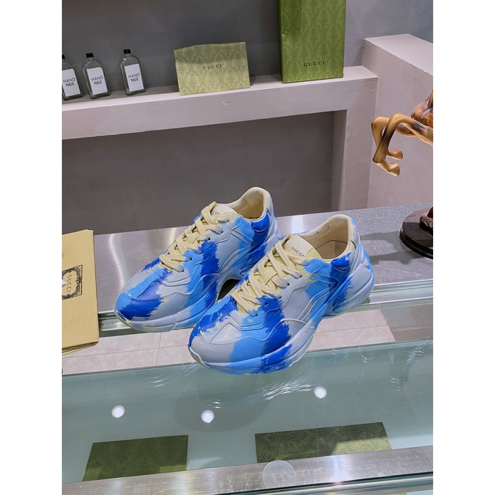 G*u*i1 sneakers