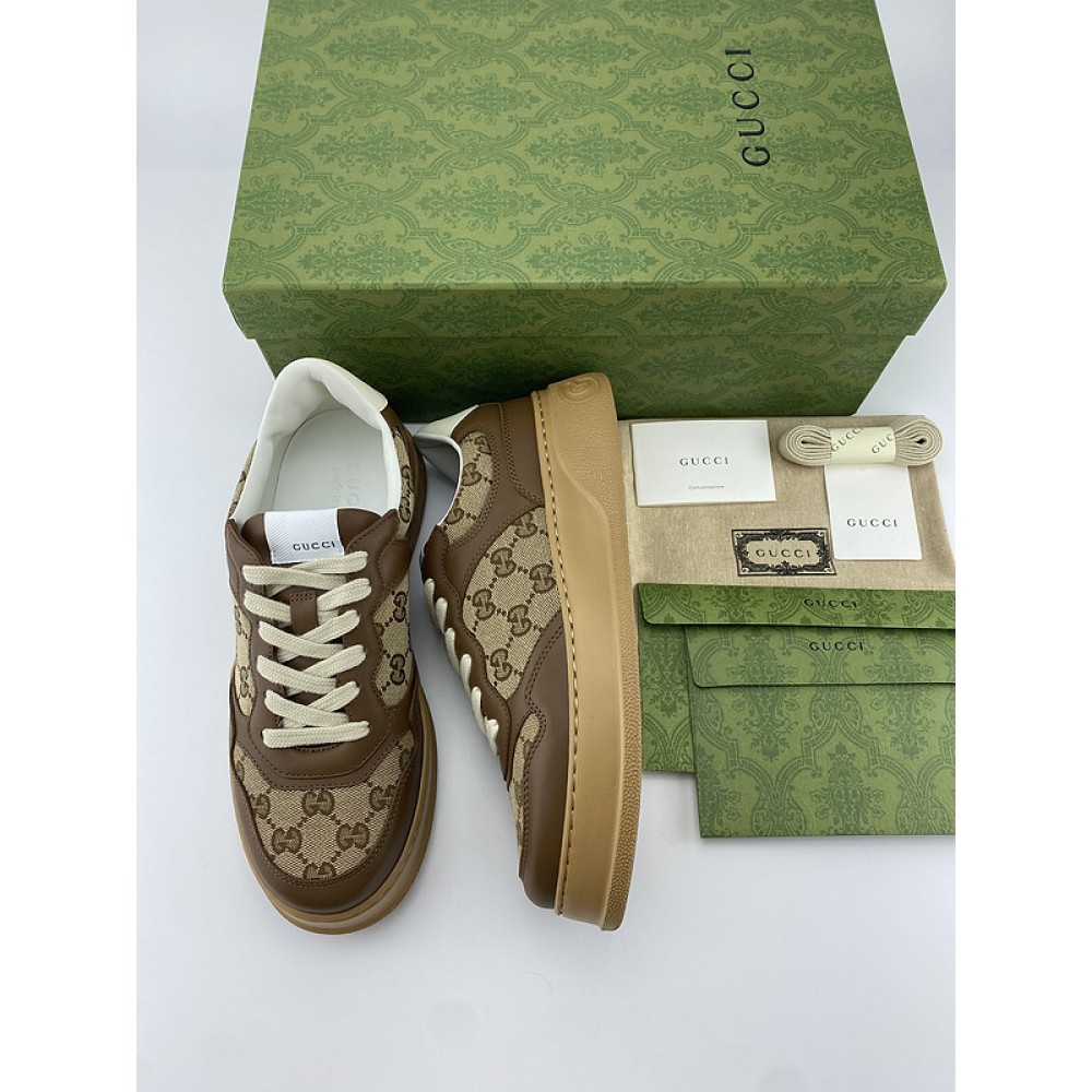 G*u*i1 sneakers