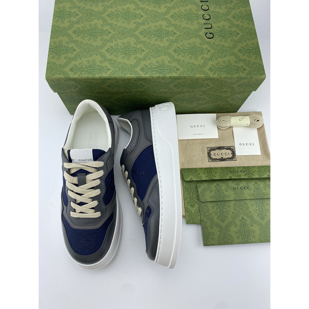 G*u*i1 sneakers