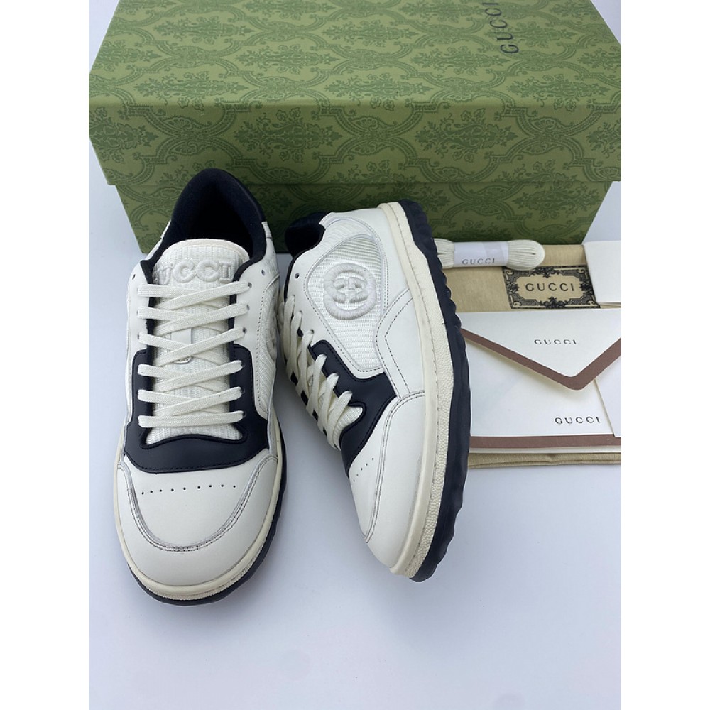 G*u*i1 sneakers