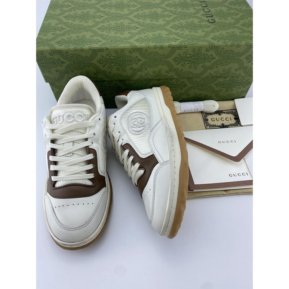 G*u*i1 sneakers