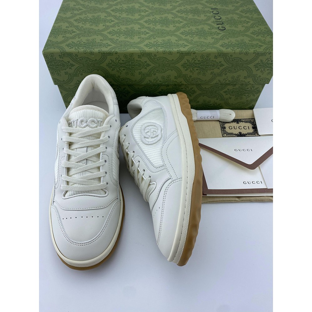 G*u*i1 sneakers