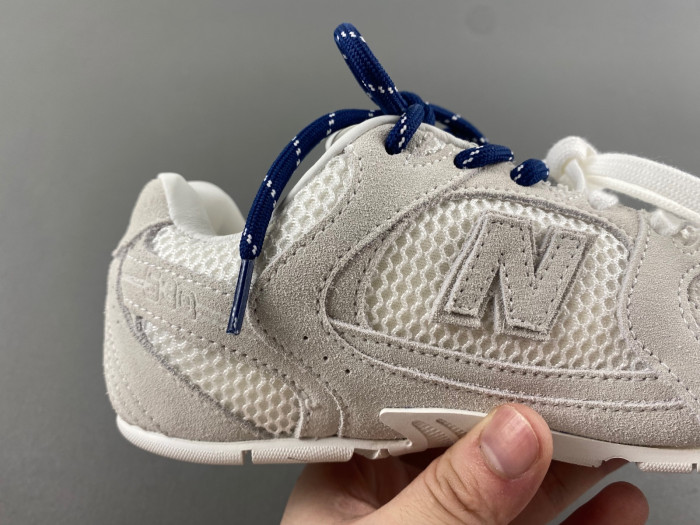 New Balance Mi­u