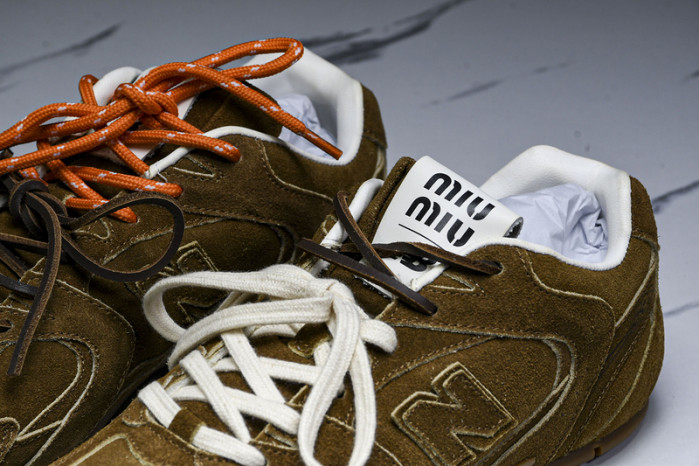New Balance Mi­u